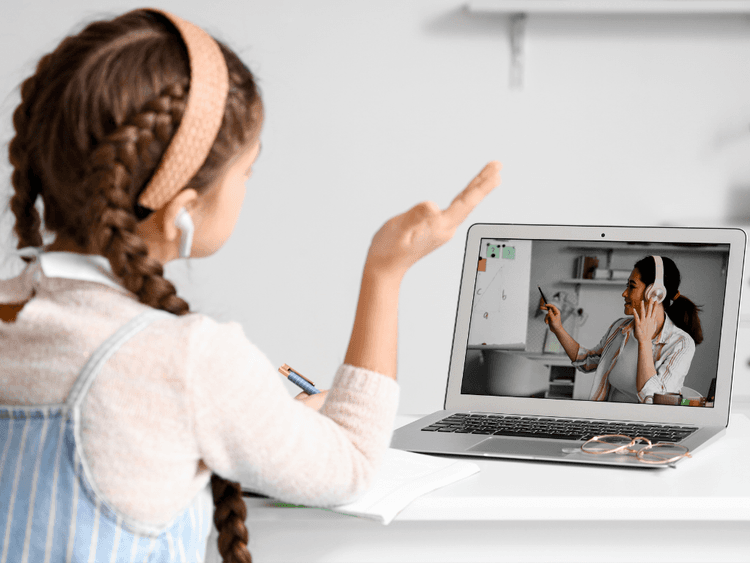 Student learning online with laptop